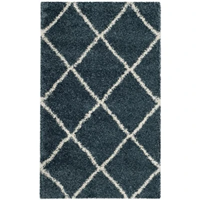 Abbildung von SAFAVIEH Zottelig Teppich für Wohnzimmer, Esszimmer, Schlafzimmer Hudson Shag Collection, Hoher Flor, Schieferblau und Elfenbein, 91 X 152 cm