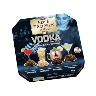 Abbildung von Edle Tropfen in Nuss Vodka Lounge 100g, flüssig gefüllte Schokoladenpralinen mit Milchschokoladen Überzug und knackigen Haselnuss Splittern