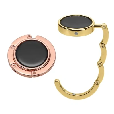 Abbildung von kwmobile Taschenhalter für Tisch 2X Faltbare Antirutsch Handtaschenhalter Haken Taschen Aufhänger Geschenkidee Gadgets Frauen Taschenhaken Set in Rosegold Gold