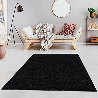 Abbildung von Fashion4Home Teppich Wohnzimmer Einfarbig Teppich, Uni fürs Kinderzimmer, Schlafzimmer, Arbeitszimmer, Büro, Flur und Küche Kurzflor Anthrazit Schwarz, Größe: 200x290 cm