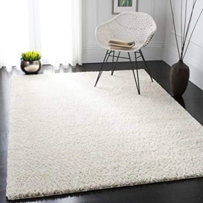 Abbildung von SAFAVIEH Zottelig Teppich für Wohnzimmer, Esszimmer, Schlafzimmer August Shag Collection, Kurzer Flor, Elfenbein, 244 X 305 cm
