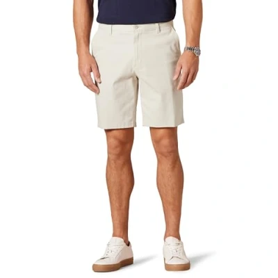Abbildung von Amazon Essentials Herren 23 cm Lange Stretch Chinohose mit schmaler Passform, Stone, 29W