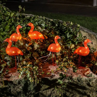 Abbildung von Konstsmide LED Acryl Flamingos, 5er Set, 40 bernsteinfarbene Dioden, 24V Außentrafo, weißes Kabel 6267 803
