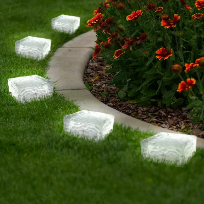 Abbildung von IDMarket Set mit 8 Solar Pflastersteinen aus Glas, 4 weiße LEDs, Gartenbeleuchtung