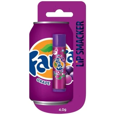 Abbildung von Lip Smacker Coca Cola Kollektion, Grape Fanta Geschmacksrichtung Lippenbalsam inspiriert von Cola, feuchtigkeitsspendend und erfrischend, Einzelverpackung im Blister