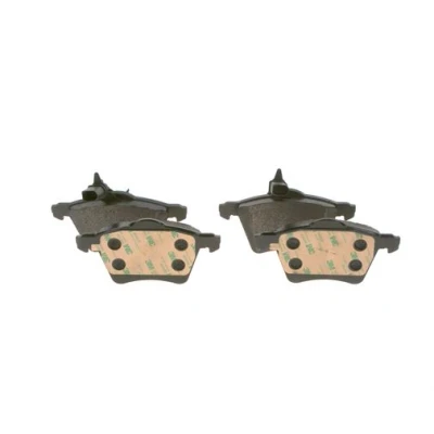 Abbildung von BOSCH 0 986 494 415 Bremsbelagsatz Low Metallic mit integriertem Verschleißsensor Anti Quietsch Blech, Kolbenclip