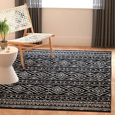 Abbildung von SAFAVIEH Boho Teppich für Wohnzimmer, Esszimmer, Schlafzimmer Tulum Collection, Kurzer Flor, Schwarz und Elfenbein, 122 X 183 cm