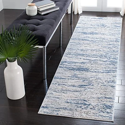 Abbildung von Safavieh Modern Teppich für Wohnzimmer, Esszimmer, Schlafzimmer Amelia Collection, Kurzer Flor, Elfenbein und Blau, 76 X 183 cm