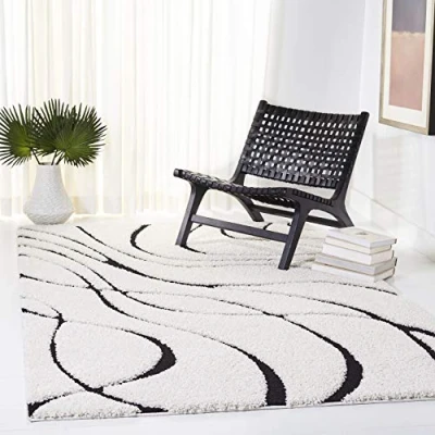 Abbildung von SAFAVIEH Zottelig Teppich für Wohnzimmer, Esszimmer, Schlafzimmer Florida Shag Collection, Hoher Flor, Creme und Schwarz , 122 X 183 cm