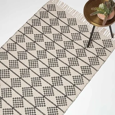 Abbildung von Homescapes Adana Teppich geometrisch schwarz Creme 90x150 cm, Fransen handgewebt, Struktur Baumwolle