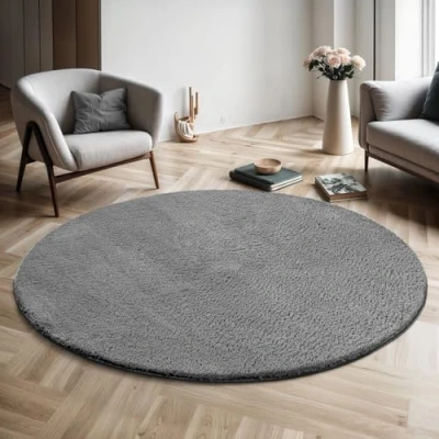 Abbildung von the carpet Relax Moderner Flauschiger Kurzflor Teppich, Anti Rutsch Unterseite, Waschbar bis 30 Grad, Super Soft, Felloptik, Anthrazit, 120 cm Rund