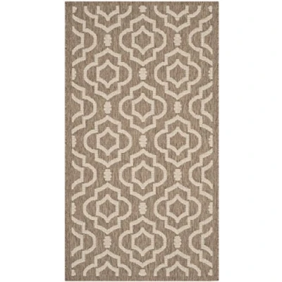 Abbildung von SAFAVIEH Geometrisch Teppich für Wohnzimmer, Esszimmer, Schlafzimmer Wasserdicht Courtyard Collection, Kurzer Flor, Braun und Knochen, 79 X 152 cm