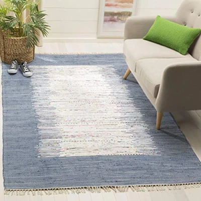 Abbildung von SAFAVIEH Modern Teppich für Wohnzimmer, Esszimmer, Schlafzimmer Montauk Collection, Kurzer Flor, Elfenbein und Dunkelblau, 183 X 274 cm