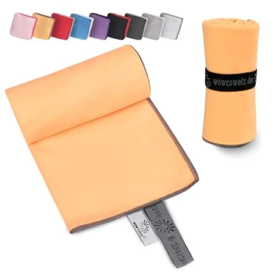Abbildung von Wowtowelz kompaktes Mikrofaser Handtuch, Reisehandtuch, Sport Fitnesshandtuch, Strand Badetuch, leicht u. schnelltrocknend, (Orange, 145 x 70 cm)