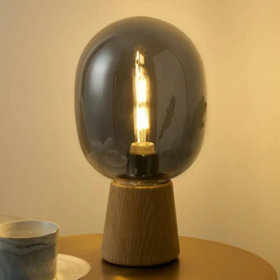 Abbildung von Pauleen 48232 Mystical Gleam Tischleuchte max. 20 Watt Rauchglas, Holz Nachttischlampe im Boho Nature Look aus Glas, E27