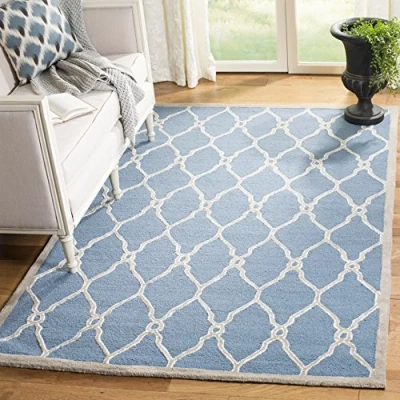 Abbildung von SAFAVIEH Modern Teppich für Wohnzimmer, Esszimmer, Schlafzimmer Cambridge Collection, Kurzer Flor, Marine und Elfenbein, 91 X 152 cm