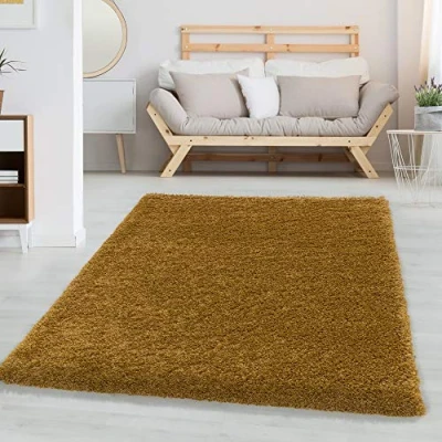 Abbildung von Carpetsale24 Shaggy Hochflor Teppich Wohnzimmer 250x350 (240x340 cm) Goldfarbe Modern Flauschiger Extra Weich, Pflegeleicht und Einfarbig für Schlafzimmer, Esszimmer Küche