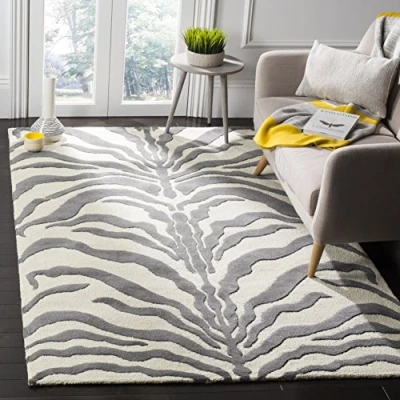 Abbildung von SAFAVIEH Zebra Teppich für Wohnzimmer, Esszimmer, Schlafzimmer Cambridge Collection, Kurzer Flor, Elfenbein und Dunkelgrau, 91 X 152 cm