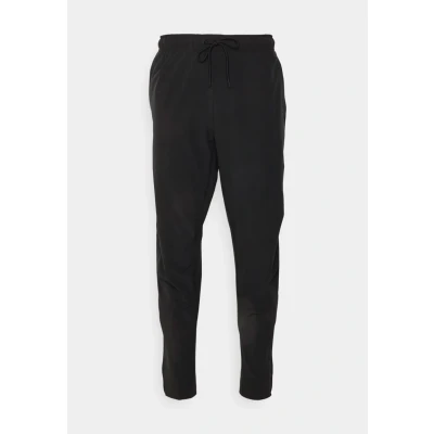Abbildung von Nike Performance Unlimited TPR Jogginghose, Herren, Größe: XL, Black/black/(black)