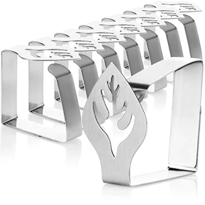 Abbildung von com four® 8x Premium Tischtuchklammern aus Edelstahl Tuchhalter für Tafelwäsche Tischklammern innen und außen mit Dekor moderne Tischklemmen Metallspangen (08 Stück/Blatt)