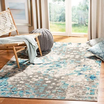 Abbildung von SAFAVIEH Moderner Schick Teppich für Wohnzimmer, Esszimmer, Schlafzimmer Madison Collection, Kurzer Flor, Grau und Blau, 122 X 183 cm