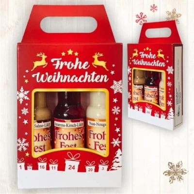 Abbildung von 3er Box Weihnachtsliköre Frohe Weihnachten Nuss Nougat Amarena Kirsch Schoko Sahne Likör Geschenk zu in schöner Geschenkverpackung