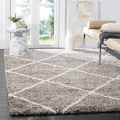Abbildung von SAFAVIEH Zottelig Teppich für Wohnzimmer, Esszimmer, Schlafzimmer Hudson Shag Collection, Hoher Flor, Grau und Elfenbein, 91 X 152 cm