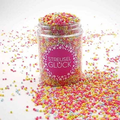 Abbildung von Streusel Glück Just Pure bunt 90g Nonpareilles Zuckerperlen Zuckestreusel Kindergeburtstag Weihnachten Tortendeko Cupcakes Muffins Christmas Kuchenstreusel Plätzchen Torte