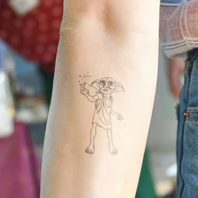 Abbildung von Harry Potter Dobby Tattoo