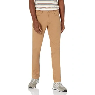 Abbildung von Amazon Essentials Herren 5 Pocket Chinohose, Komfortabler Stretch, Schmale Passform (Früher Goodthreads), Helles Khakibraun, 29W / 29L