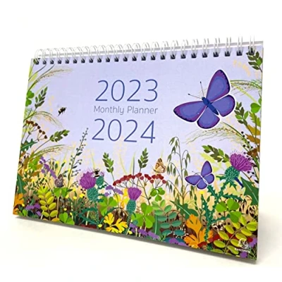 Abbildung von Exacompta Ref. GS010Z Juni 2023 Juli 2024 Schmetterling Design, Monat pro Seite, inklusive UK Feiertage, 210 mm x 150 mm, steht sicher auf einem Schreibtisch oder Regal