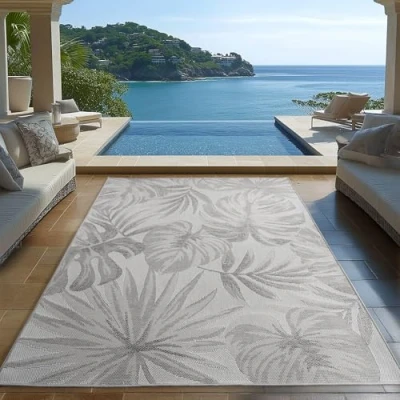 Abbildung von Carpetsale24 Outdoor Teppich Grau 120x170 cm, Wetterfest &amp; UV beständig, ideal für Küche, Balkon, Terrasse, Garten auch Wohnzimmer und Esszimmer, Palmblätter Design, Leicht zu Reinigen