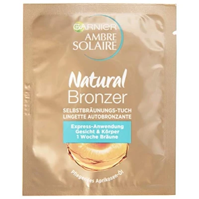 Abbildung von Garnier Ambre Solaire Selbstbräunungs Tuch, Selbstbräuner mit Aprikosenkernöl, Bräunungsbeschleuniger in Gold (15 Stück)