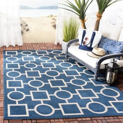 Abbildung von SAFAVIEH Zeitgenössische Teppich für Wohnzimmer, Esszimmer, Schlafzimmer Courtyard Collection, Kurzer Flor, Marine und Beige, 160 X 231 cm