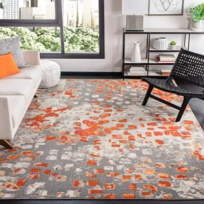 Abbildung von SAFAVIEH Moderner Schick Teppich für Wohnzimmer, Esszimmer, Schlafzimmer Madison Collection, Kurzer Flor, Grau und Orange, 91 X 152 cm
