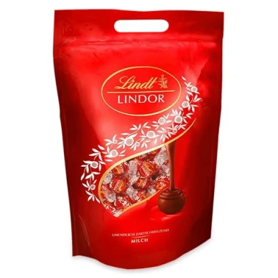 Abbildung von Lindt Schokolade LINDOR Kugeln Milch 2 kg Beutel Ca. 155 aus Vollmilch mit zartschmelzender Füllung Pralinengeschenk Großpackung Schokoladengeschenk