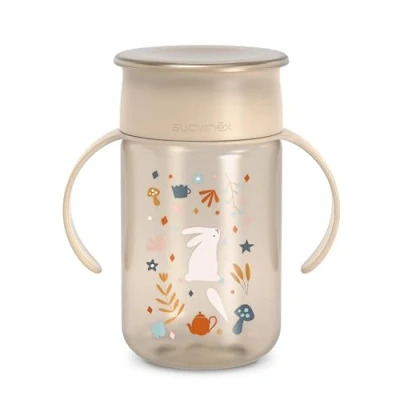 Abbildung von Suavinex, Trinklernbecher für Babys, mit auslaufsicherer Scheibe, Magic Cup Rand, auslaufsicher, 360 , abnehmbare Griffe, hygienischer Deckel, spülmaschinenfest, 340 ml, Wonderland, Beige