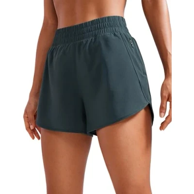Abbildung von CRZ YOGA Damen Kurz Sporthose Laufhose High Waist Fitness Sport Shorts Kurze Hose mit Reißverschlusstasche Melanit 38