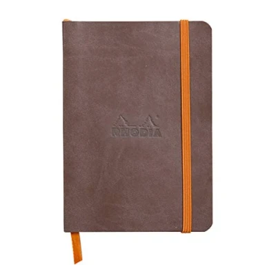 Abbildung von Rhodia 117353C Rhodiarama Notizheft (mit weichem Umschlag, dot grid, 72 Blatt, 90 g elfenbeinfarbenes Papier, DIN A6, 10,5 x 14,8 cm, Lesezeichen, Innentasche) 1 Stück schokoladenbraun
