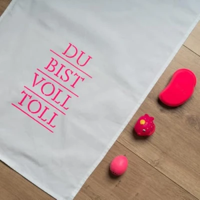 Abbildung von Geschirrtuch weiß, du bist voll toll in Pink