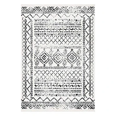 Abbildung von SAFAVIEH Boho Teppich für Wohnzimmer, Esszimmer, Schlafzimmer Tulum Collection, Kurzer Flor, Elfenbein und Schwarz, 91 X 152 cm