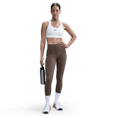 Abbildung von Nike W NK Dri Fit Universa High Rise Pocket Tight Damen (Schlamm L)