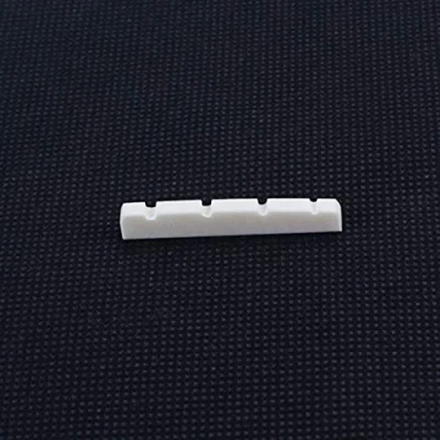 Abbildung von Alnicov Bass Bone Nut für 4 Saiten Gitarre Ersatz (38 x 6 mm, ungebleicht)