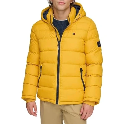 Abbildung von Tommy Hilfiger Herren Legacy Hooded Puffer Jacket Daunenalternativer Mantel, gelb, M