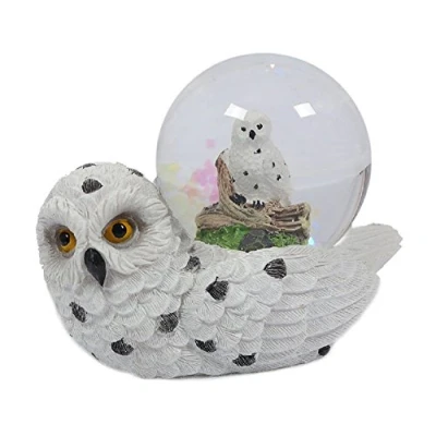 Abbildung von PIA International Glitzerkugel Schneeeule, liegend Schneekugel Tier Tiere Vogel Vögel Schneekugeln Eule