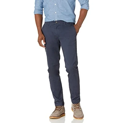 Abbildung von Amazon Essentials Herren Chinohose, Komfortabler, Gewaschener Stretch, Skinny Passform (Früher Goodthreads), Marineblau, 34W / 28L