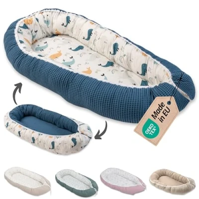 Abbildung von ULLENBOOM ® Bettnestchen Kuschelnest Baby 55x95 cm, kuscheliges Babynest, Made in EU, (1 tlg), Ideal für Neugeborene als Reisebett, Blau Wale