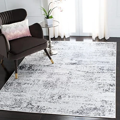 Abbildung von SAFAVIEH Modern Teppich für Wohnzimmer, Esszimmer, Schlafzimmer Amelia Collection, Kurzer Flor, Elfenbein, 152 X 244 cm