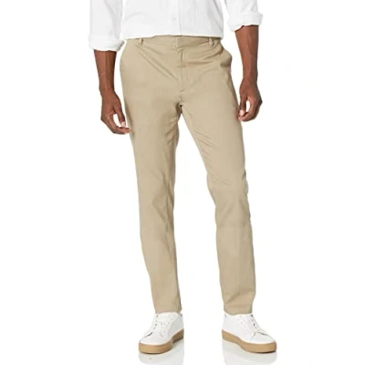 Abbildung von Amazon Essentials Herren Faltenresistente Stretch Chinohose mit schmaler Passform und Flacher Vorderseite, Bräunen, 29W / 29L