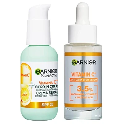 Abbildung von Garnier Gesichtsserum gegen Flecken, mit Vitamin C und Salicylsäure, aufhellende glättende Wirkung, 30 ml + in aufhellender Creme LSF 25, 50 2 Produkte